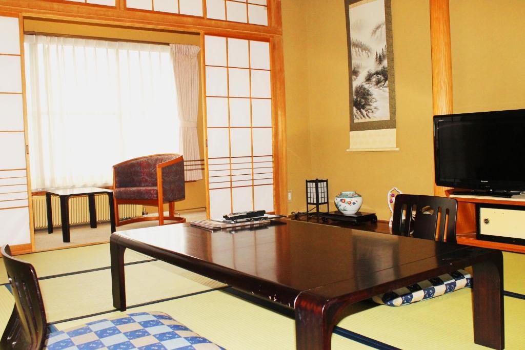 Hotel Echigo Yuzawa Onsen Sakura Tei Habitación foto